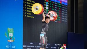 Tiga Emas dan Rekor Dunia, Kado Perpisahan Lifter Rahmat Erwin Abdullah dengan Kelas 73 Kg