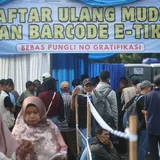Kompas poto tema hitam yuk mudik 2025