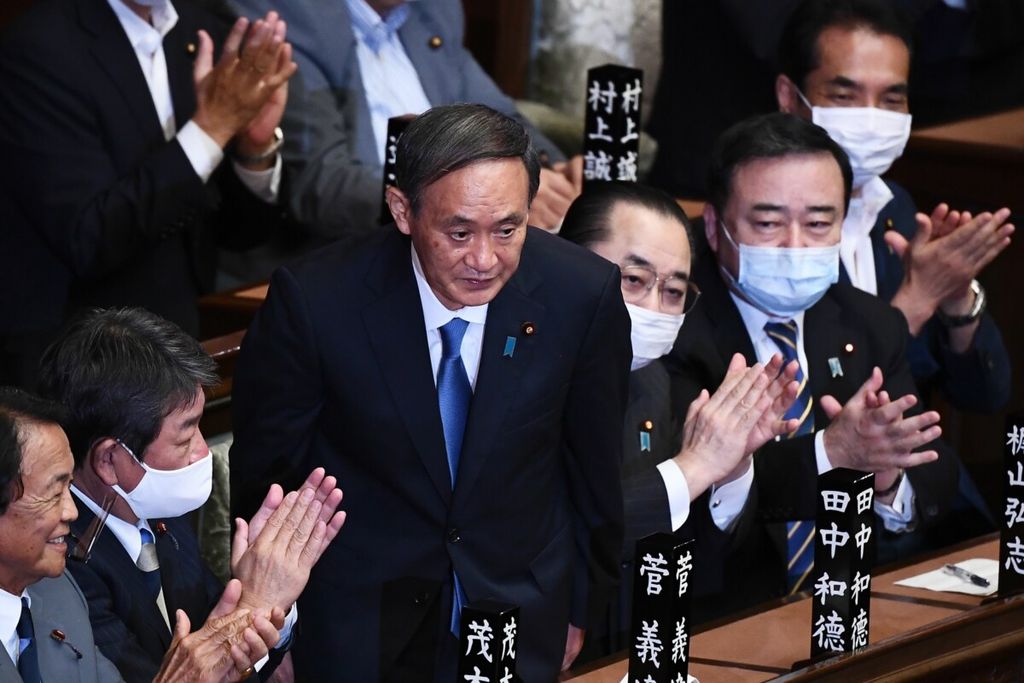 https://assetd.kompas.id/Lhk5B1hjkc24iRKxJOPRAStveaE=/1024x683/https%3A%2F%2Fkompas.id%2Fwp-content%2Fuploads%2F2020%2F09%2FJAPAN-POLITICS-VOTE_91873372_1600242819.jpg
