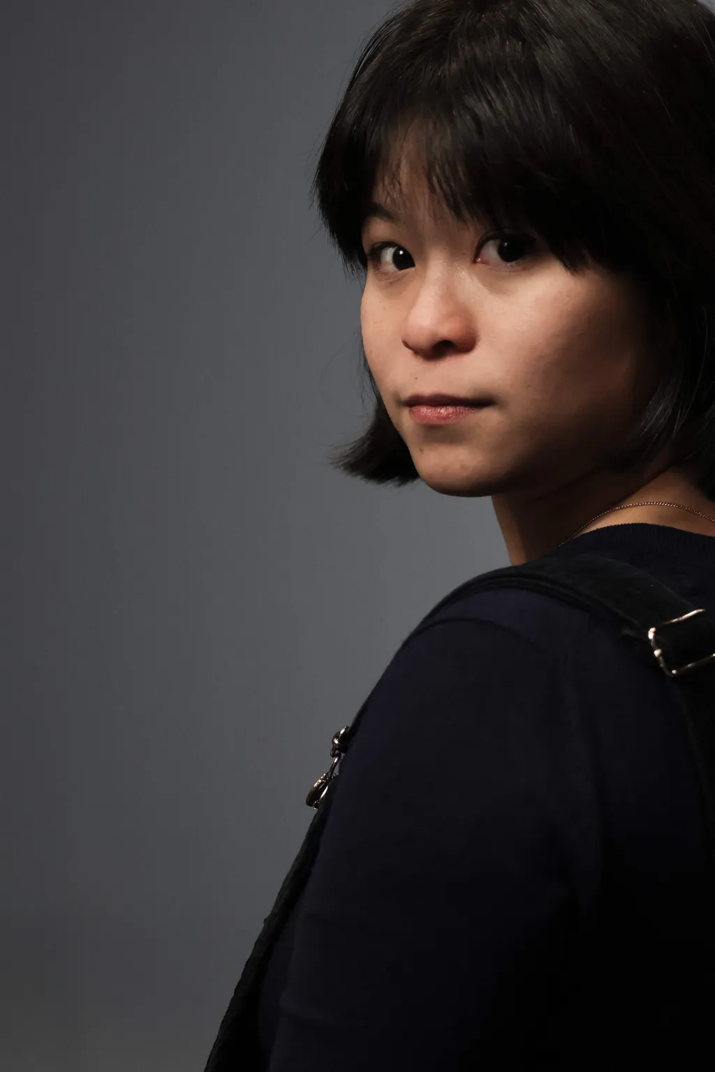 Clara Achour, a woman claiming to have been allegedly drugged and raped by her boyfriend in 2018 poses during a photo session in Paris on January 17, 2025. Clara Achour filed a complaint against France to the European court of Justice for denial of justice following the acquittal of her former boyfriend. (Photo by Thibaud MORITZ / AFP)