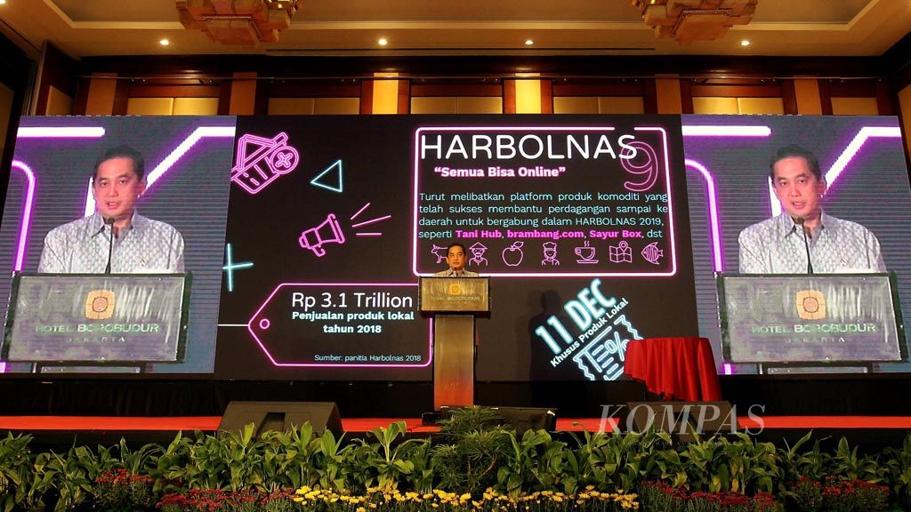 https://assetd.kompas.id/YVSlSa4yh6Bsnxhnk5bsOINZvsU=/1024x576/filters:watermark(https://cdn-content.kompas.id/umum/kompas_main_logo.png,-16p,-13p,0)/https%3A%2F%2Fkompas.id%2Fwp-content%2Fuploads%2F2019%2F12%2F20191209_ENGLISH-E-DAGANG_B_web_1575895431.jpg