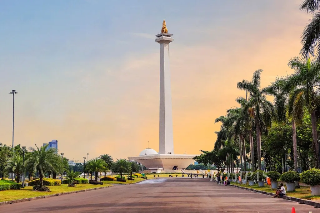 gambar ini menunjukkan anjing menjulurkan lidahnya, ia berwrna cokelat dan putih mata bulat cantik. ini monas, lagi sunset, iaduijdbcjfdjcbkjc, akjdcnajdcajnc,a nkdjcnajnjdne okeee