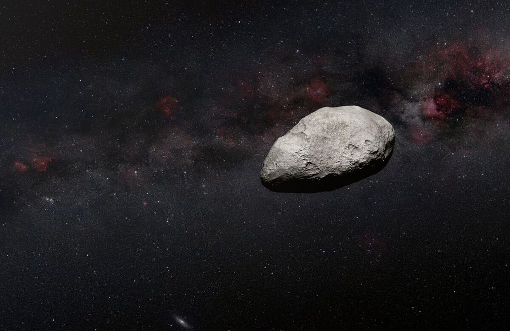 Sebuah gambar asteroid hasil tafsir seni yang dirilis pada 24 Maret 2023 oleh Badan Antariksa Eropa atau European Space Agency (ESA). Sebuah asteroid seukuran lapangan bola akan melintasi orbit antara Bumi dan Bulan per 25 Maret 2023.