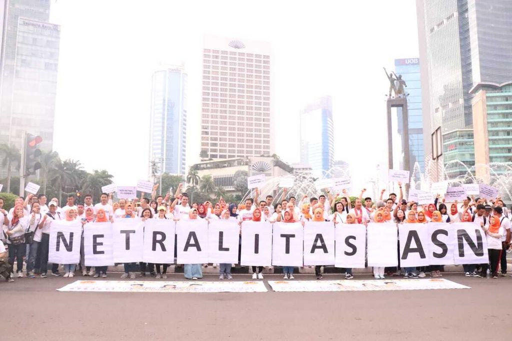 Kampanye publik netralitas aparatur sipil negara (ASN) di Hari Bebas Kendaraan di Jalan MH Thamrin, Jakarta, Minggu (10/3/2019).