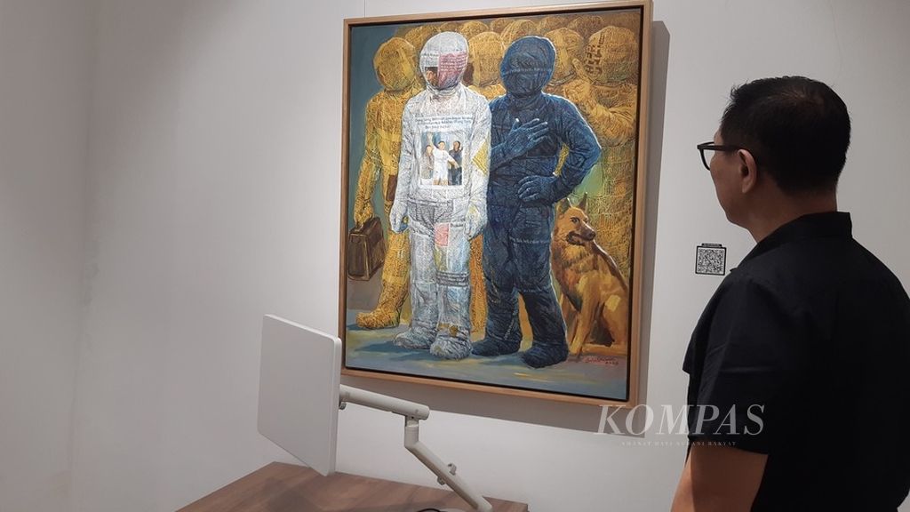 Lukisan Budi Ubrux berjudul Urip Mung Mampiur Nambang, Rabu (11/12/2024). Karya ini ditampilkan di dalam pameran bersama yang bertajuk Desember Awal, di Galeri Seni Wonder, Jakarta, 5 Desember 2024 hingga 5 Maret 2025.