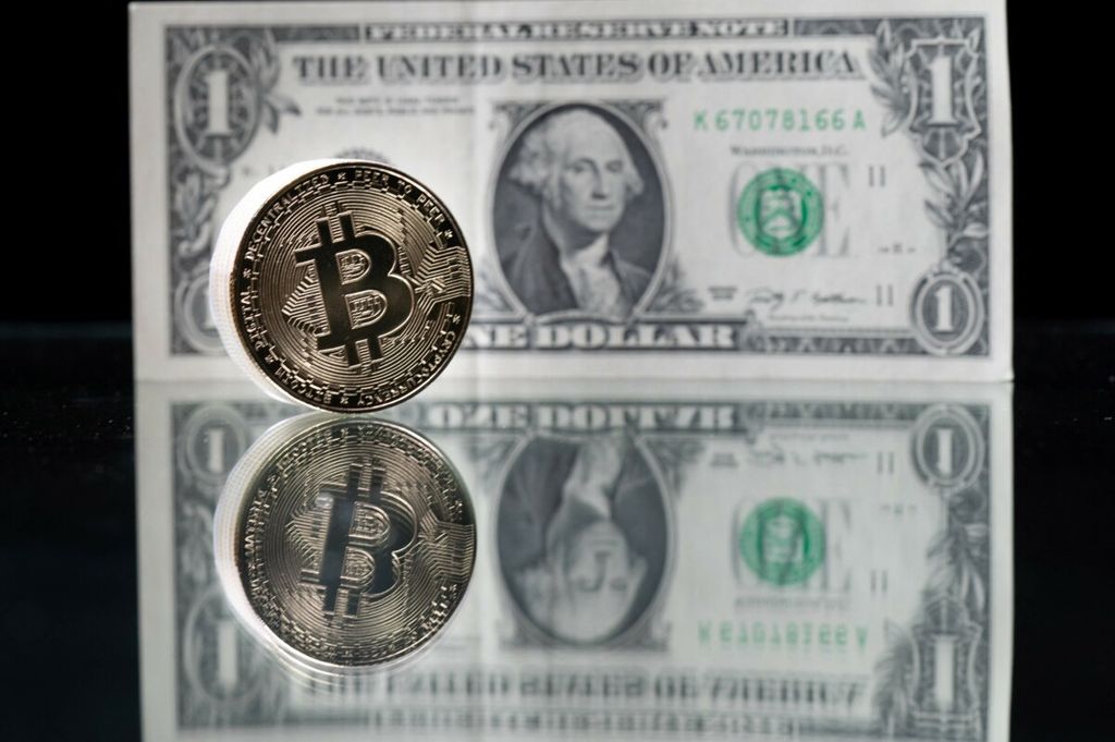 https://assetd.kompas.id/xSedMCGfvjMhKr6xpG4TMuiGw6k=/1024x681/https%3A%2F%2Fkompas.id%2Fwp-content%2Fuploads%2F2021%2F04%2FECONOMY-MARKETS-CURRENCY-BITCOIN_95916432_1619538122.jpg